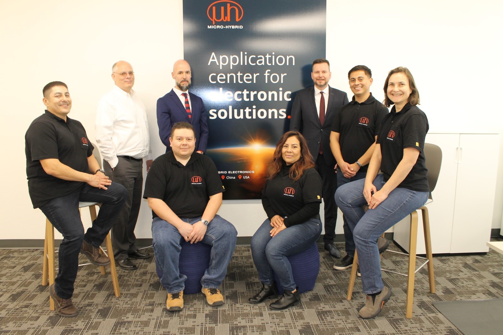 Micro-Hybrid Team posed in their new application center in the UA Tech Park