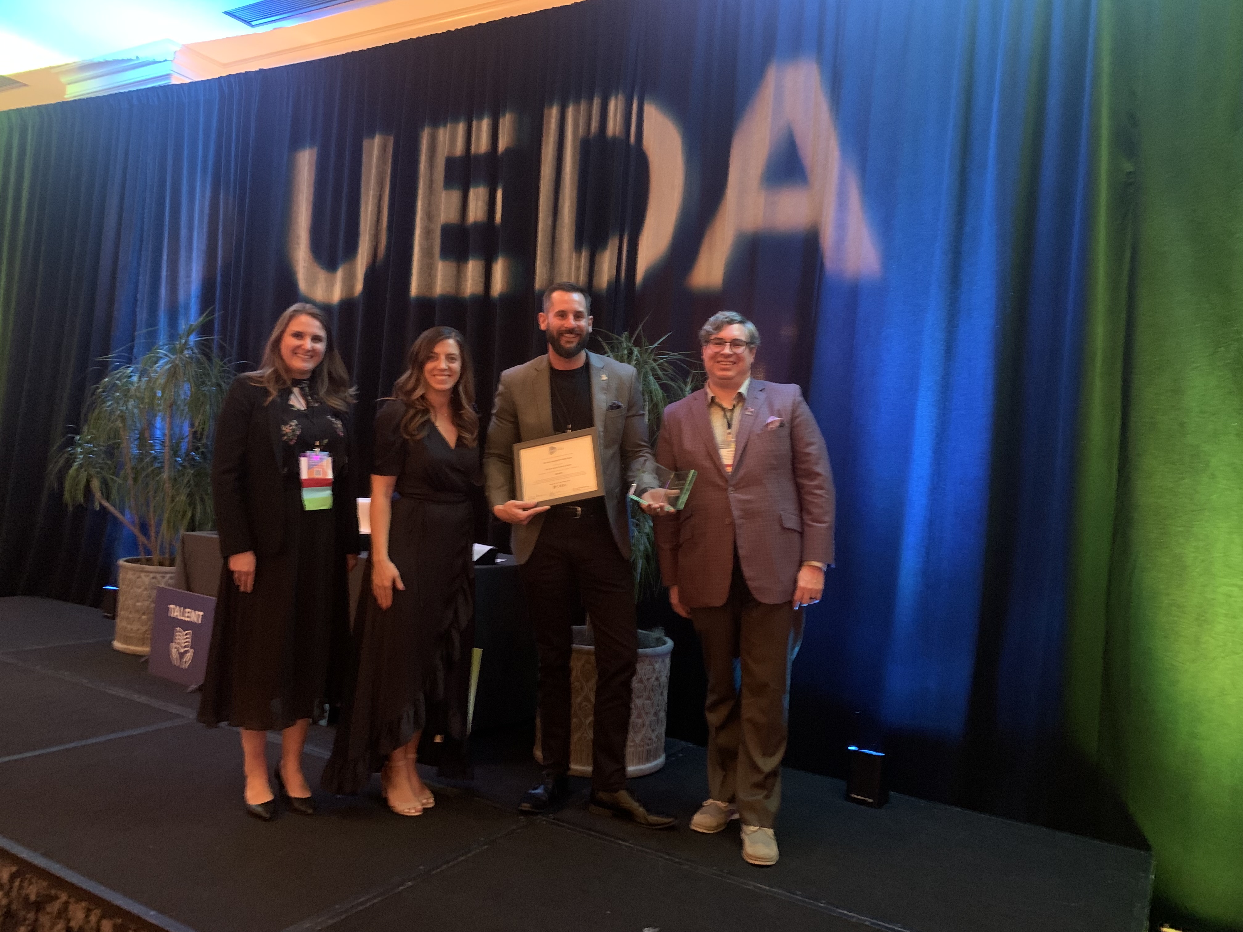 UA Center for Innovation Executive Director, Eric Smith, accepts UEDA Judges' Choice Award